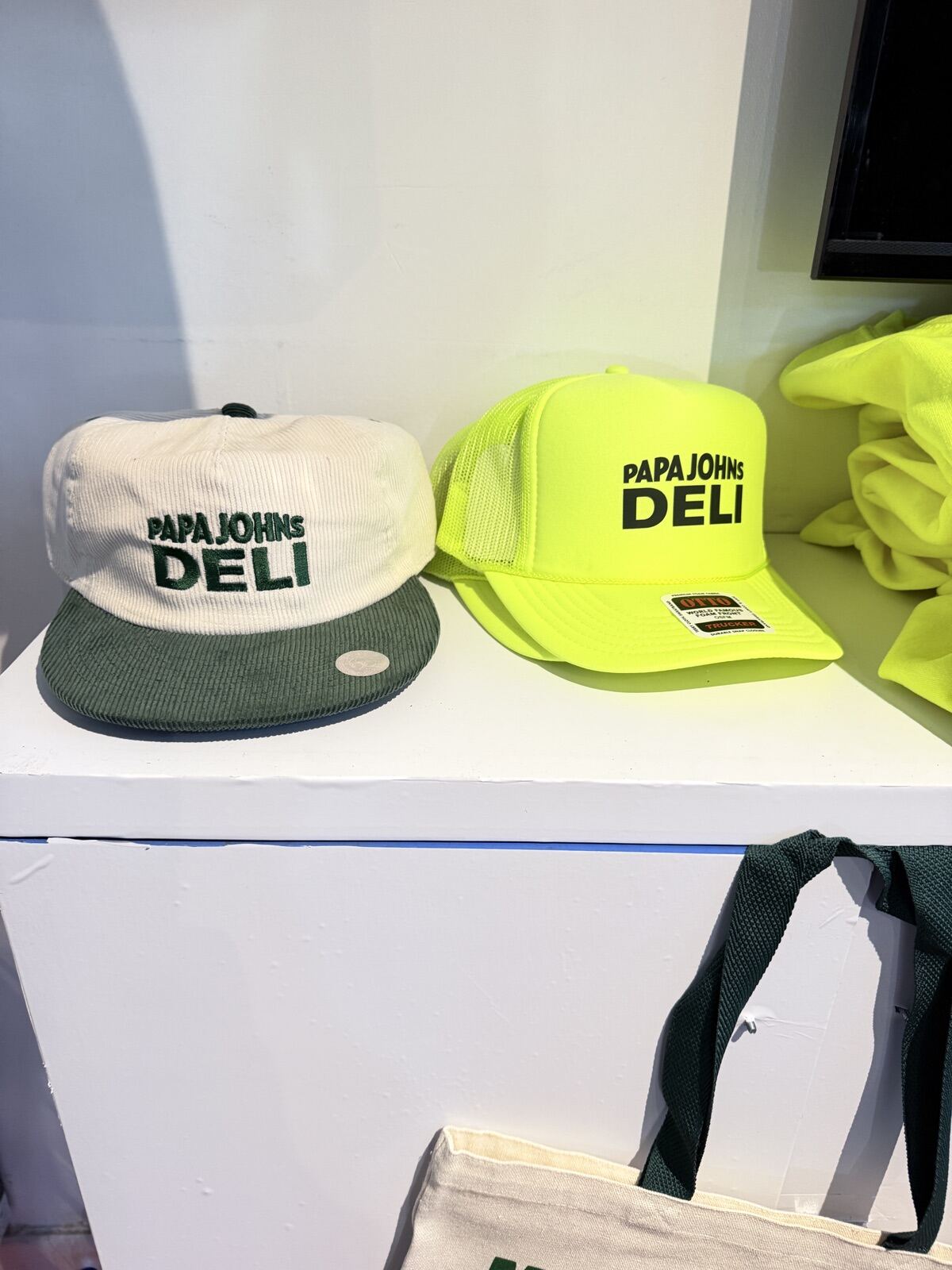 Finished custom merch staged on a display shelf